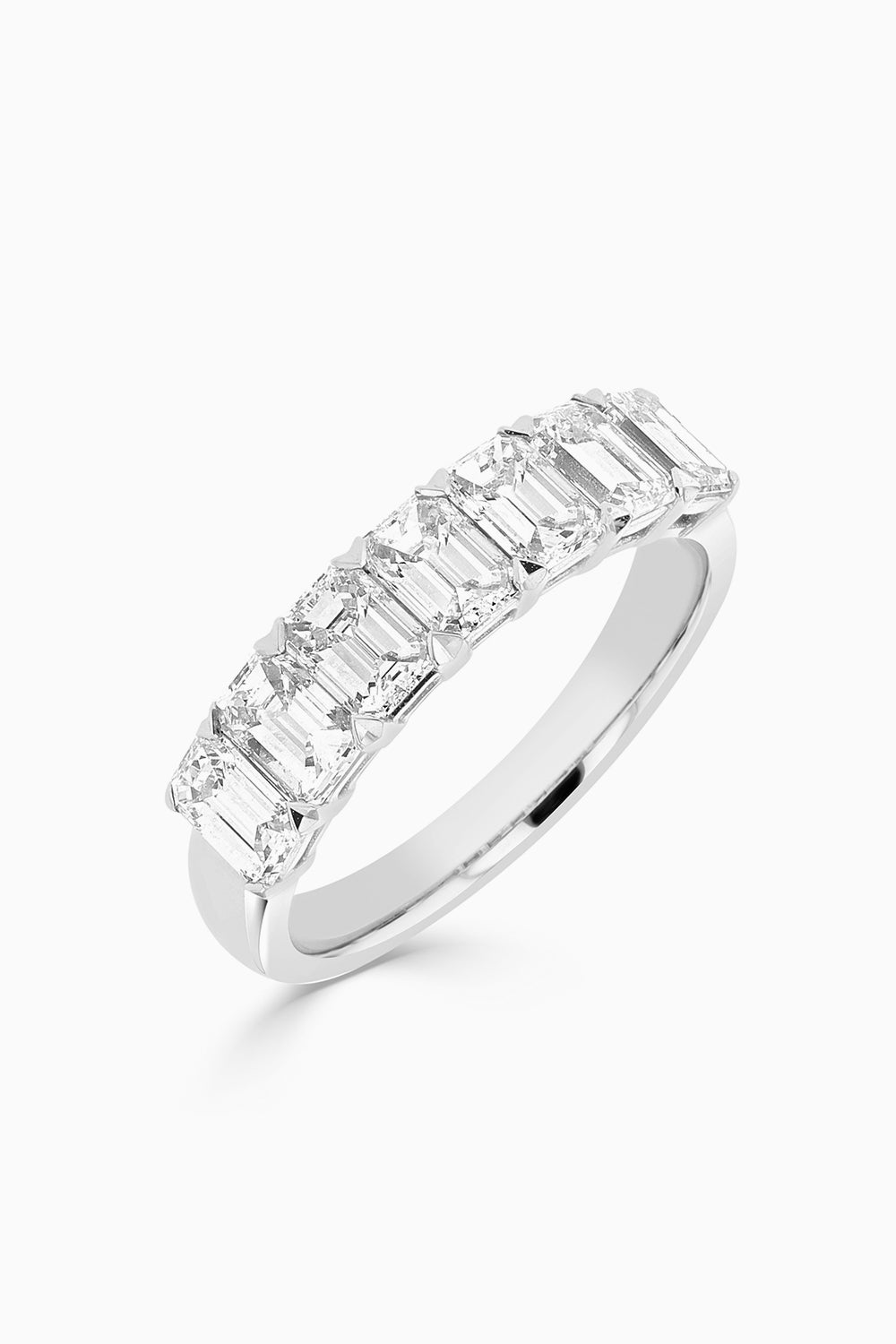 Seven Calibrated Emerald Cut Diamond Ring